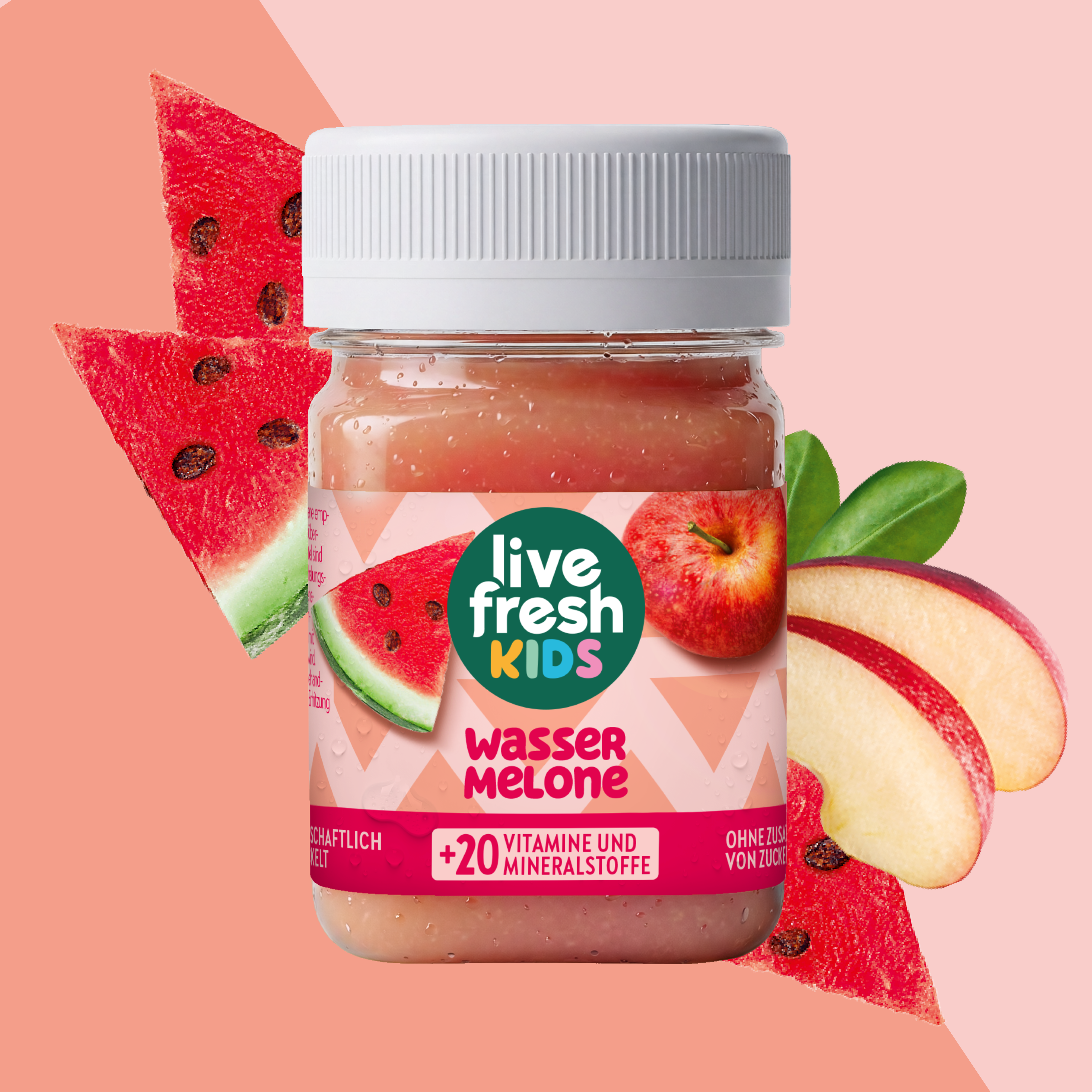 LiveFresh Kids Wassermelone im Glas vor rosafarbenem Hintergrund mit Wassermelonenstücken und Apfelscheiben. Auf dem Etikett steht "live fresh KIDS". "WASSER MELONE" und "+20 VITAMINE UND MINERALSTOFFE".